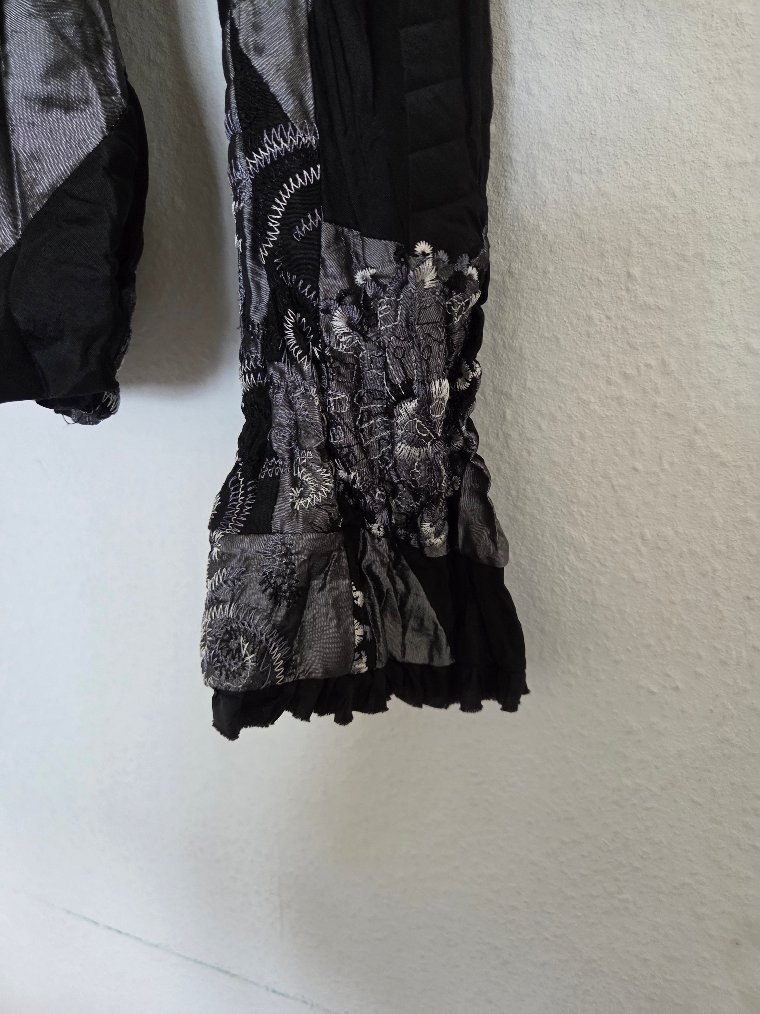 Veste noire/argentée