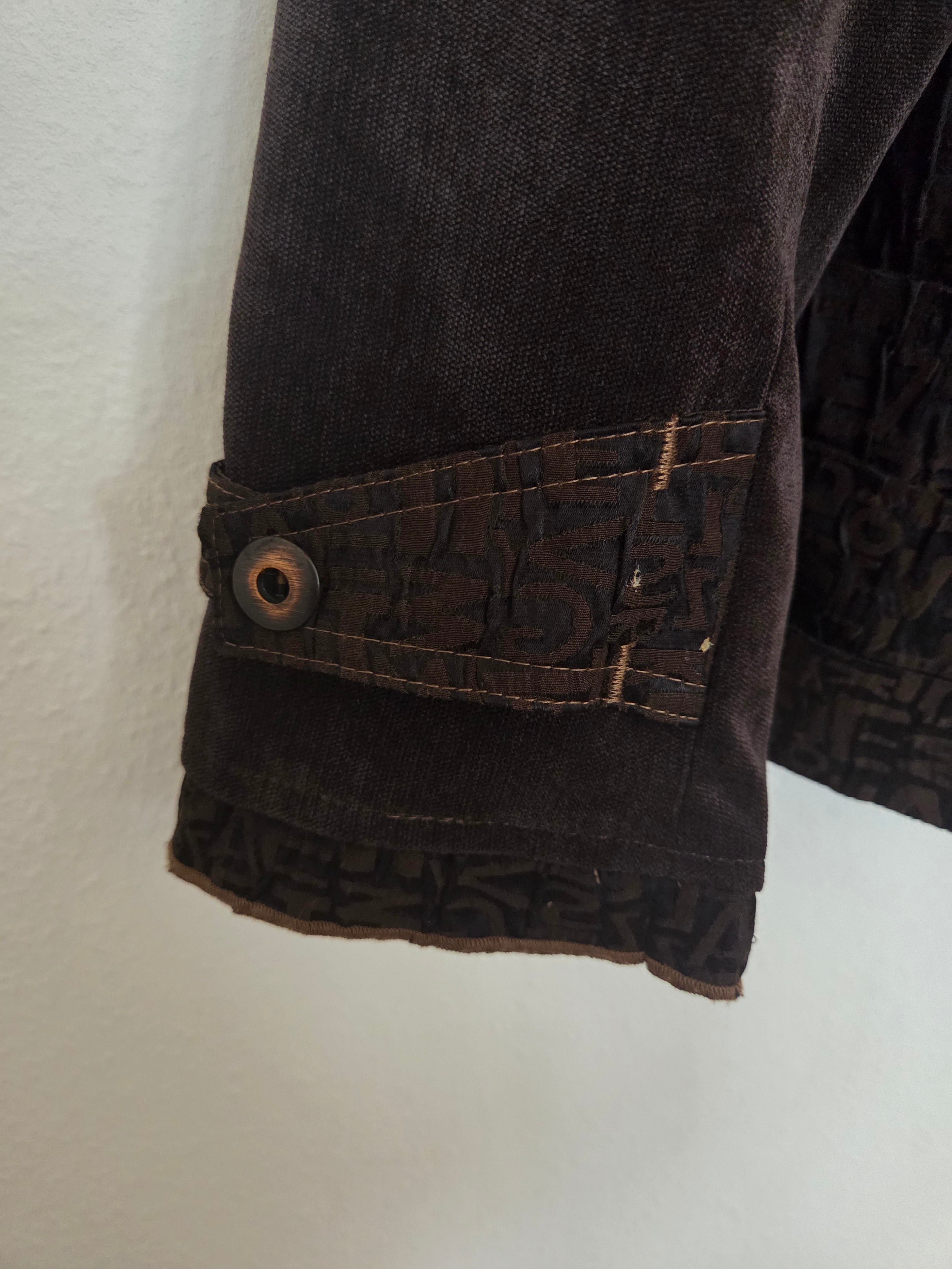 Veste avec motifs écritures