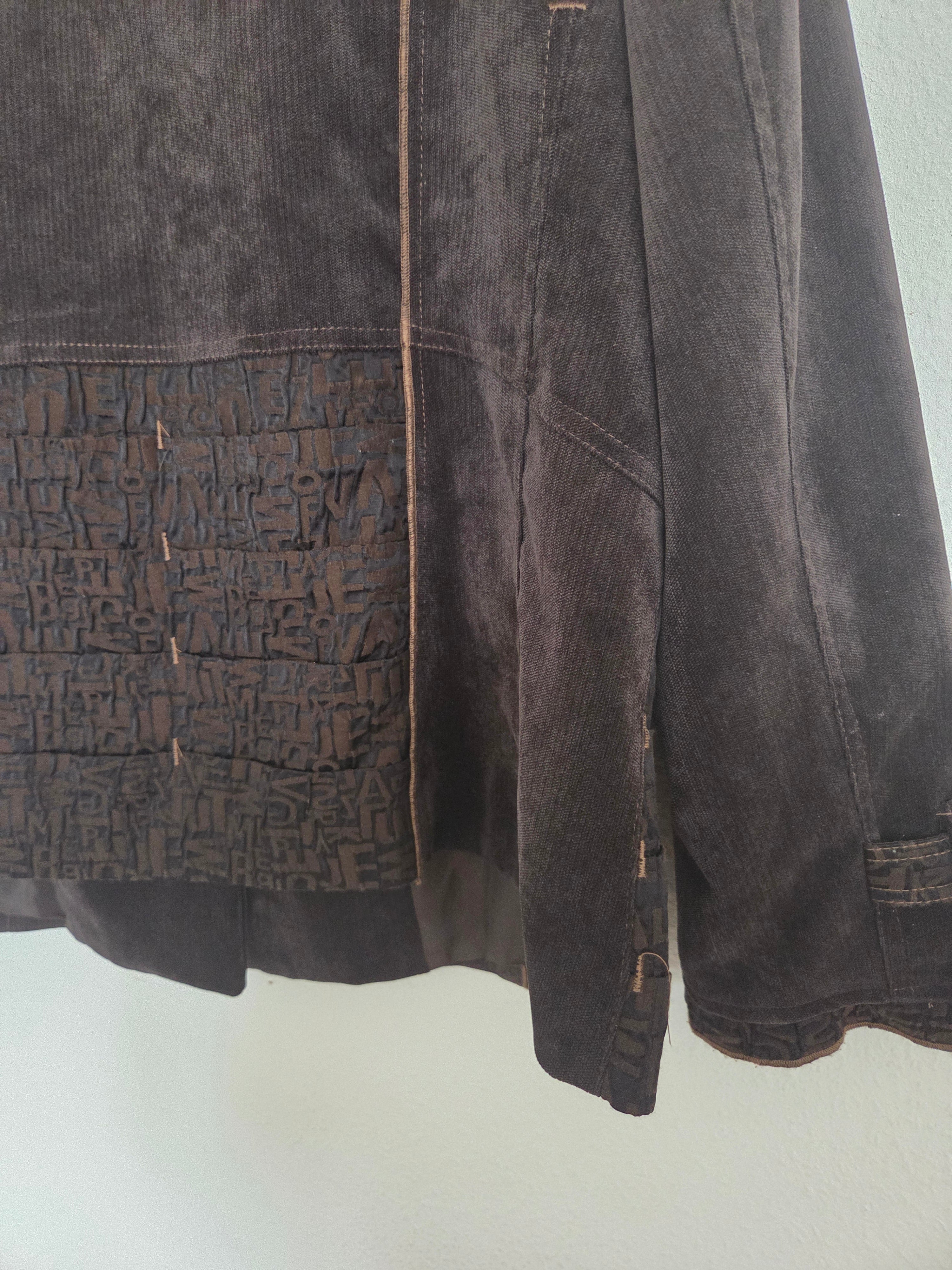 Veste avec motifs écritures