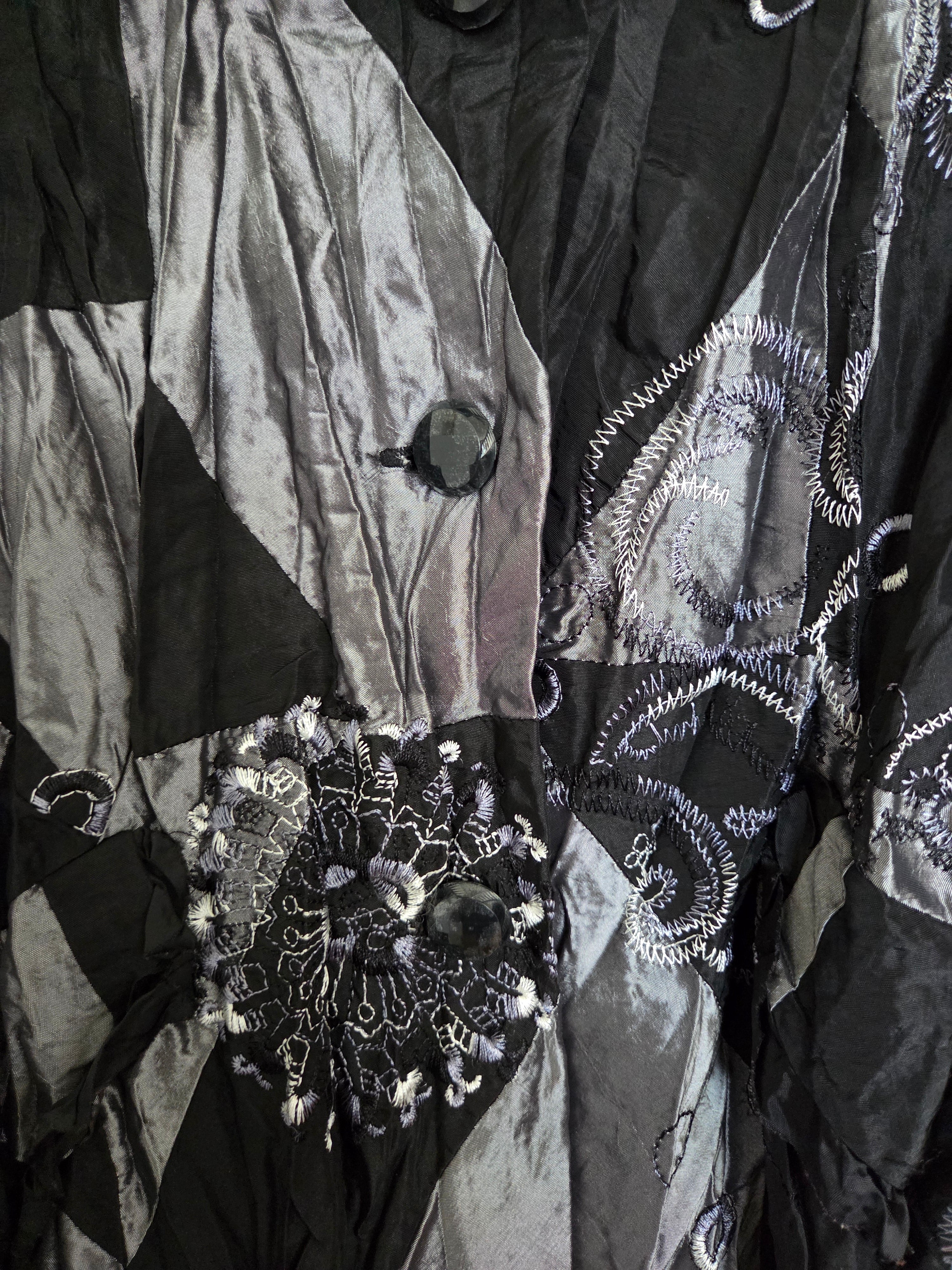 Veste argentée/ noire
