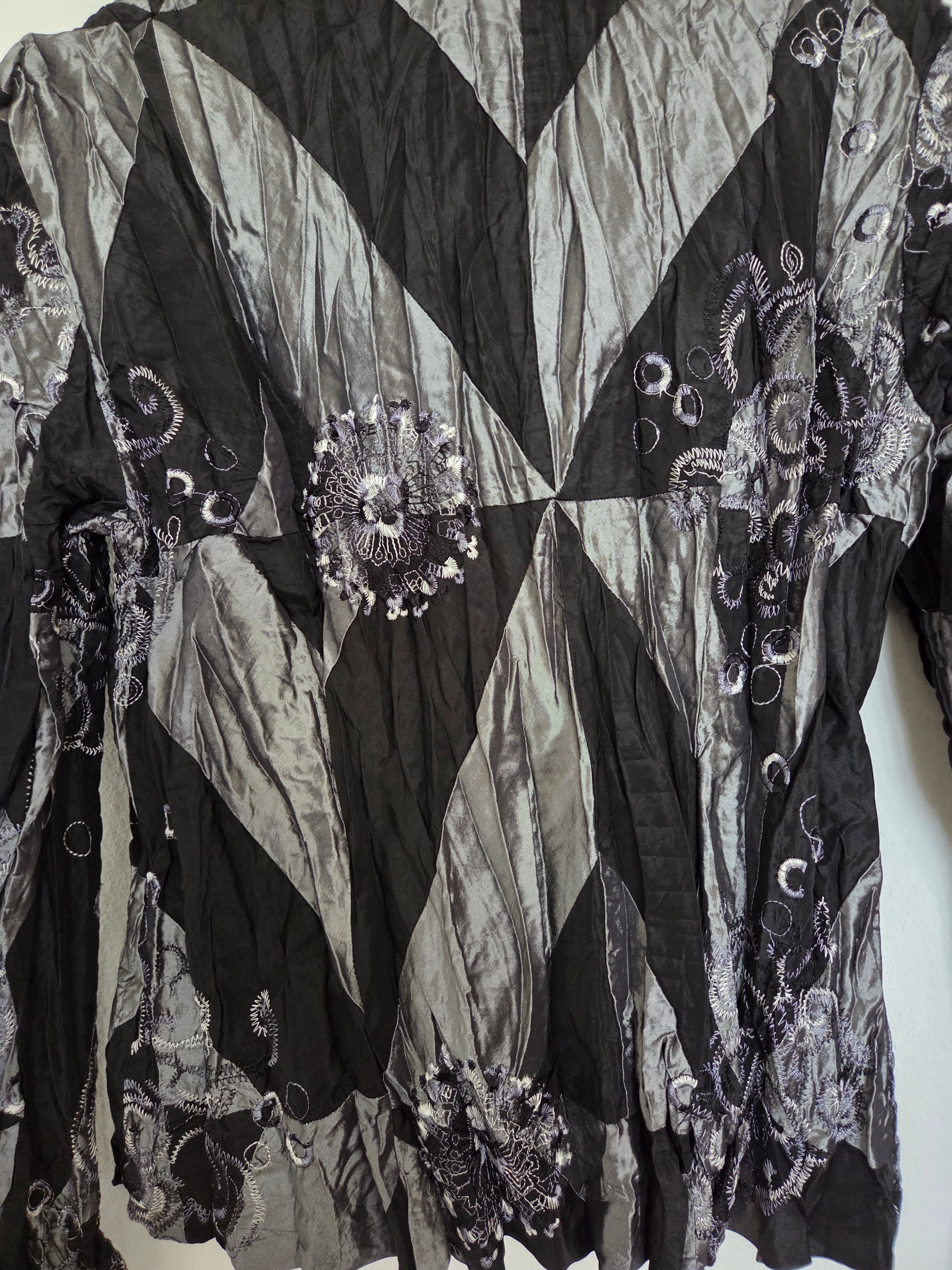 Veste argentée/ noire